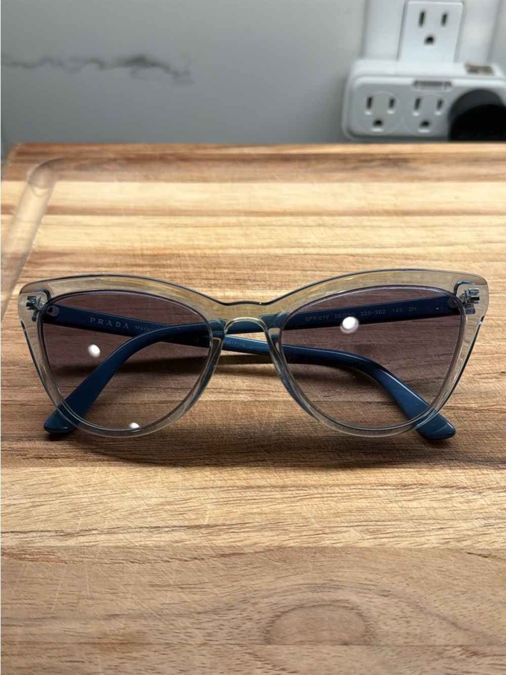 Prada Translucent Clear Cat-Eye Sunglasses with Navy Temples